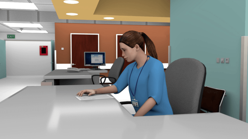 Figure 3: A nurse at the reception, reading orders.